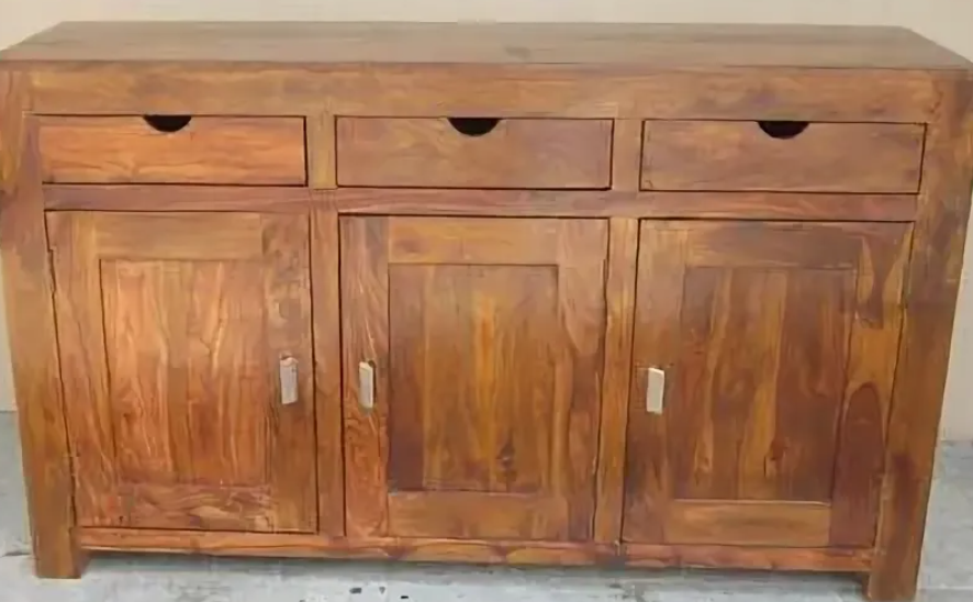 craftsman working on wood furniture